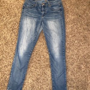 Blue American eagle jeans.